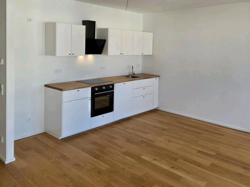2-Zimmer Neubauwohnung mit EBK & Balkon in top Lage in D-Heerdt