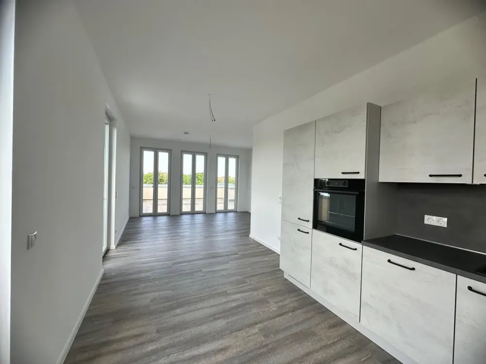 Exklusive 2-Zimmer-Dachgeschosswohnung mit traumhafter Terrasse - Perfekt für Singles & Paare