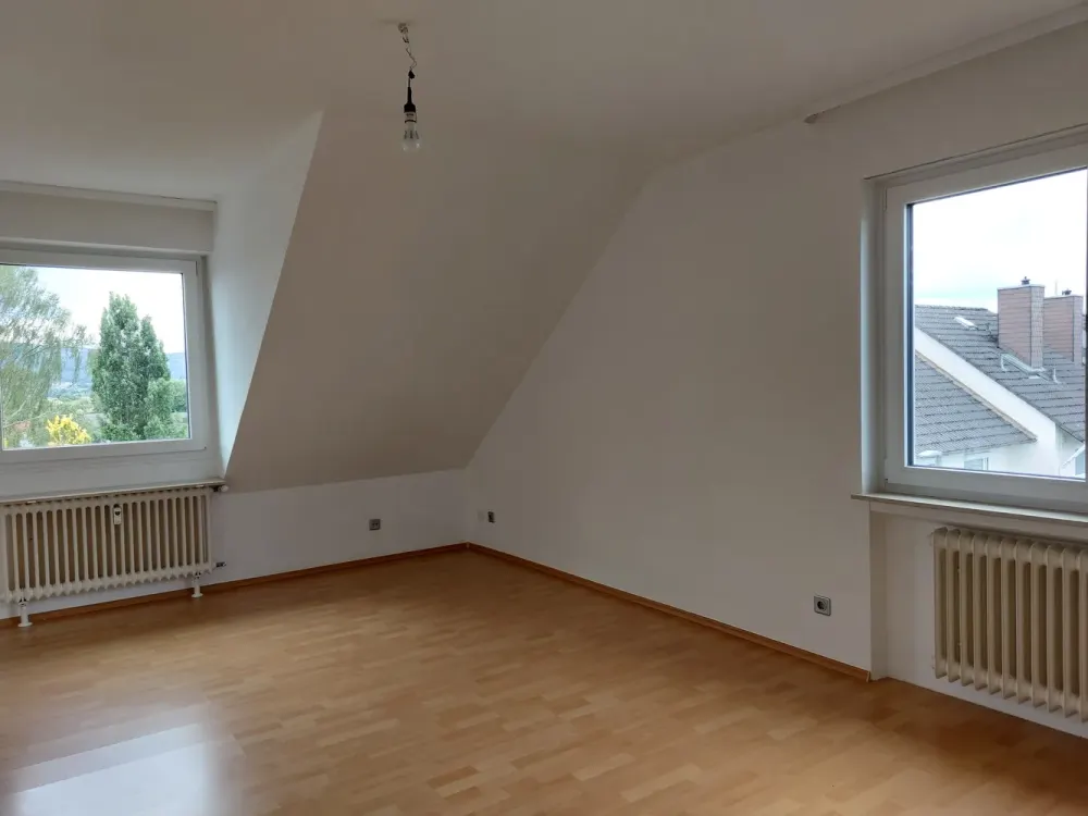 Wohnen mit Charakter: 3-Zimmer-Dachgeschosswohnung in Wehrheim