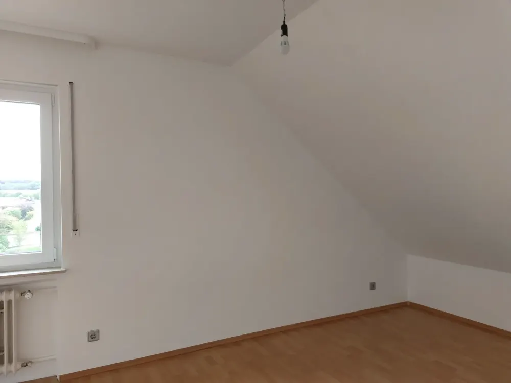 Wohnen mit Charakter: 3-Zimmer-Dachgeschosswohnung in Wehrheim