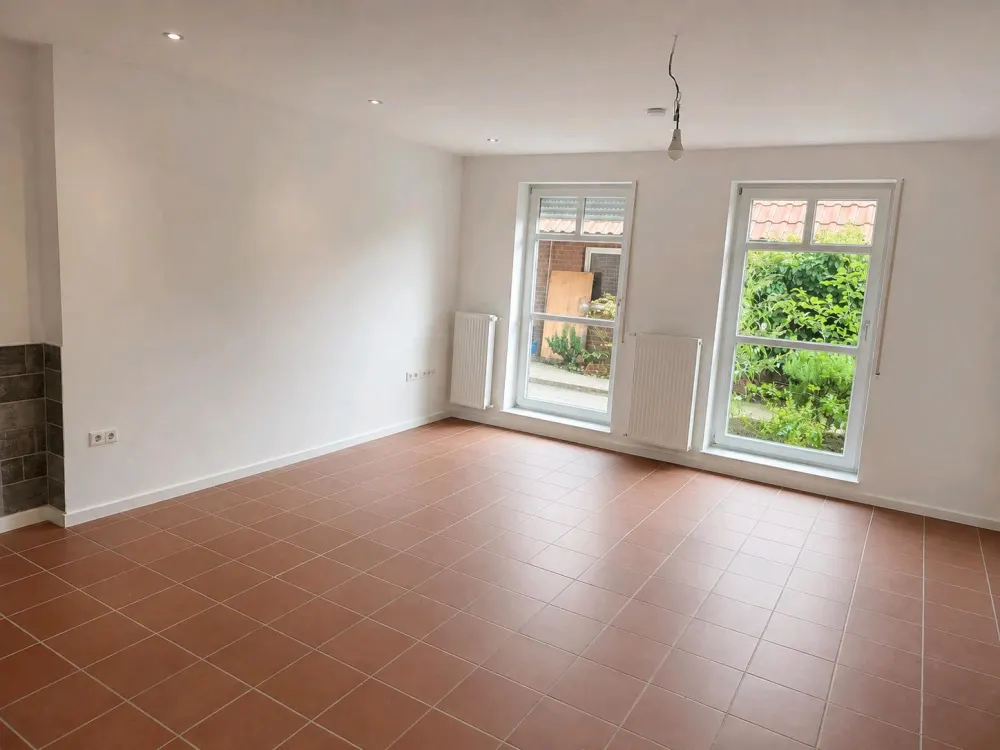 Wunderschöne, renovierte 3-Zimmer Wohnung mit Garten,Kamin&Garage