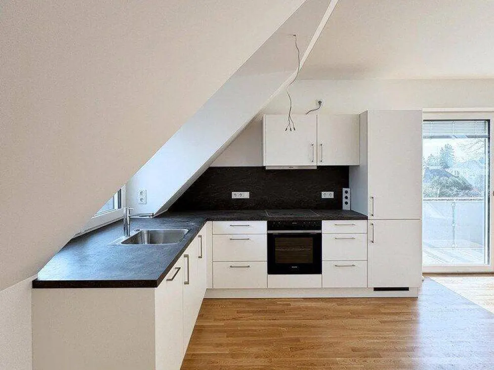 Erstbezug nach Kernsanierung: Gemütliche 3-Zimmer-DG-Wohnung in München-Trudering - WE 7