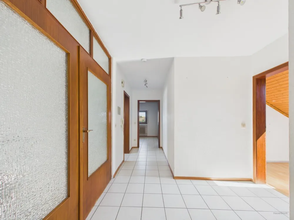 Gemütliche 3-Zimmer-Dachgeschosswohnung mit Einbauküche und Gartennutzung