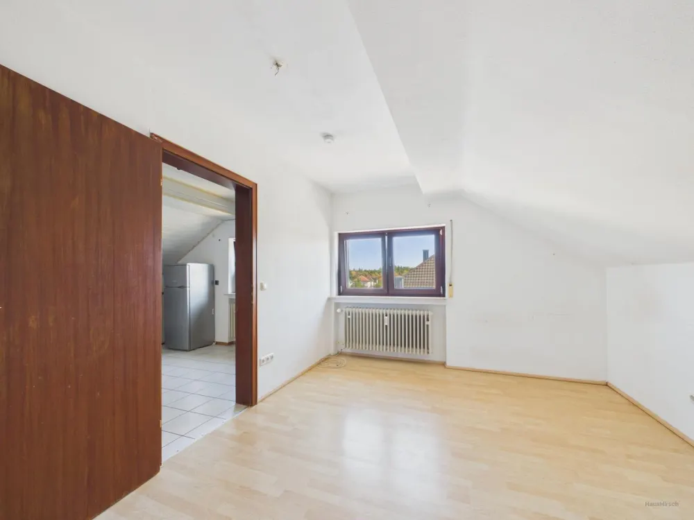 Gemütliche 3-Zimmer-Dachgeschosswohnung mit Einbauküche und Gartennutzung