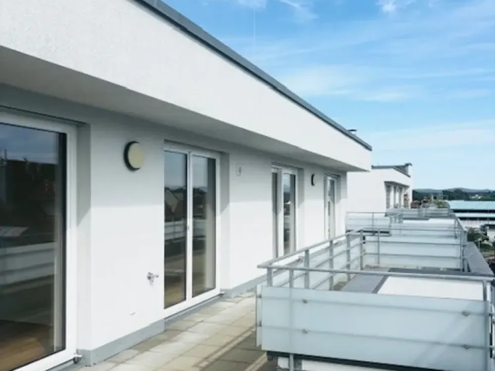 High-quality 4.5-room apartment with large roof terrace in FN city centre