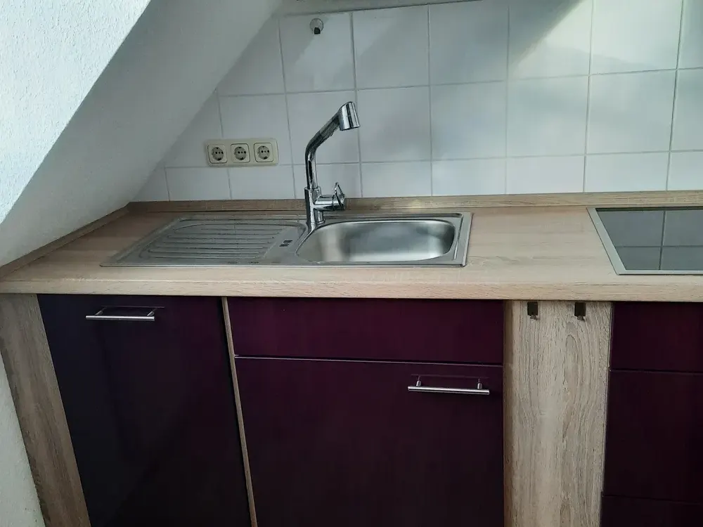 Romantische Dachgeschoßwohnung mit Balkon und Einbauküche