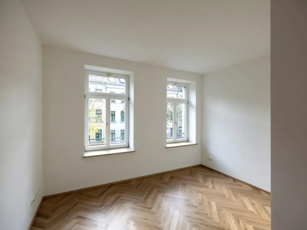 Traumhafte 4-Zimmerwohnung im denkmalgeschützten Altbau mit Balkon