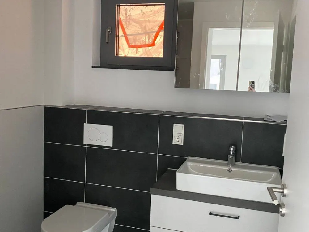 Bright, partially furnished 2-room apartment in new building in Alt-Saarbrücken