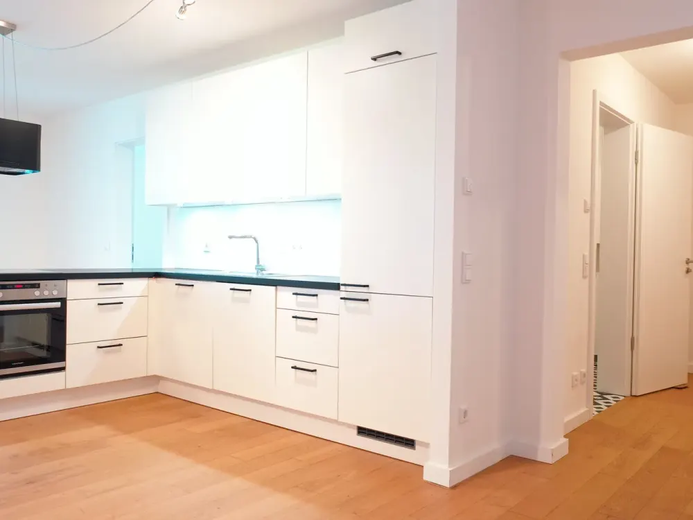 Hochwertige 2-Zimmer-Wohnung mit Südbalkon, Einbauküche und Fußbodenheizung im 4. Obergeschoss