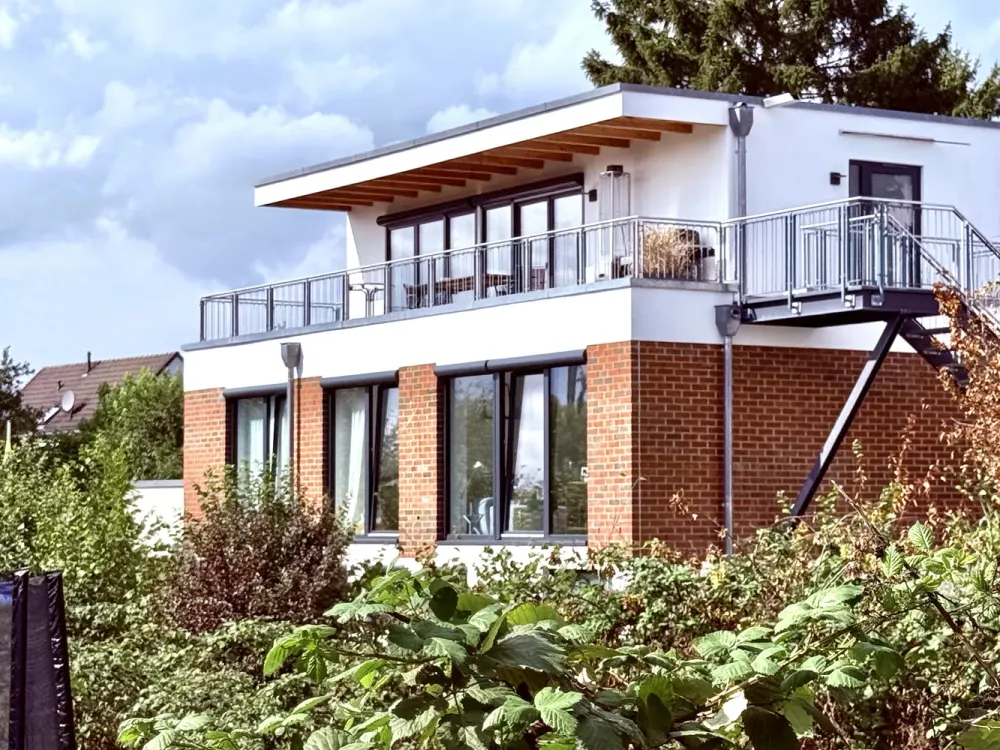 Haus im Haus - Gartenmaisonettewohnung in Grünlage und Rheinnähe