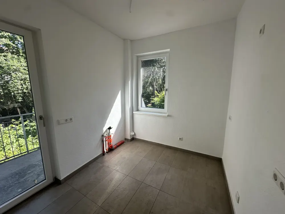 Modernisierte 3-Zimmer-Wohnung mit sonnigem Balkon ins Grüne