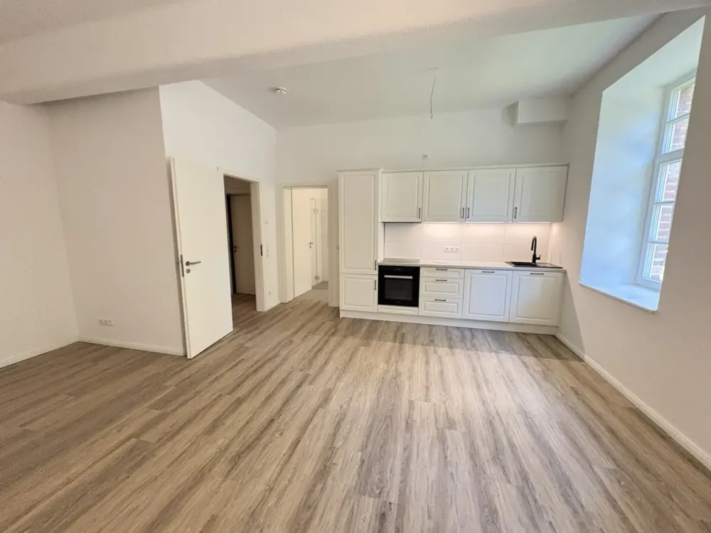 Neuwertige 1 Zimmer-Erdgeschosswohnung inkl. Einbauküche - Mit Fahrstuhl und Stellplatz am Haus