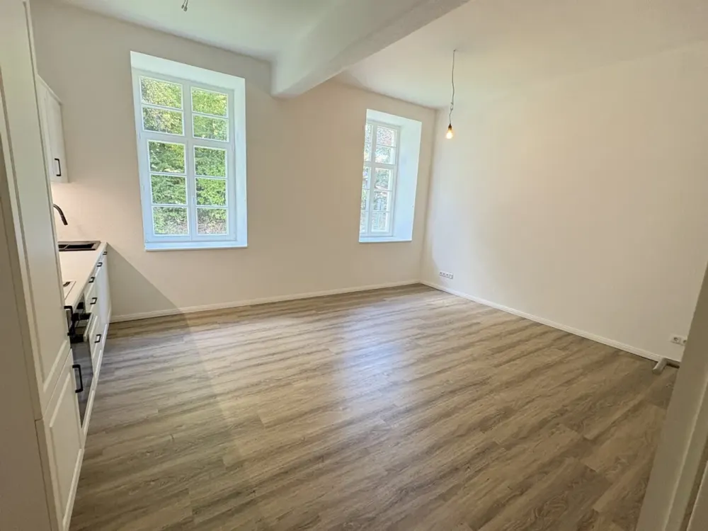 Neuwertige 1 Zimmer-Erdgeschosswohnung inkl. Einbauküche - Mit Fahrstuhl und Stellplatz am Haus