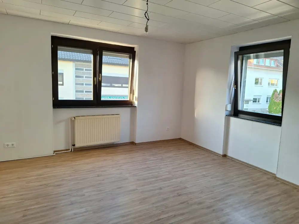 2028; 2-Room Apartment with Balcony, Shared Garden Use & Garage in Völklingen