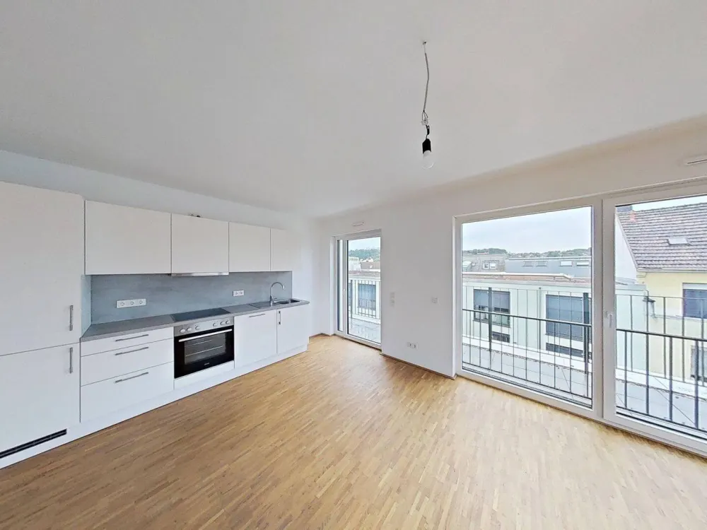 Großzügige 3-Zimmer-Wohnung mit Dachterrasse & moderner Einabauküche