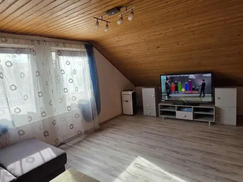 Bright and Well-Maintained Top Floor Apartment with Air Conditioning