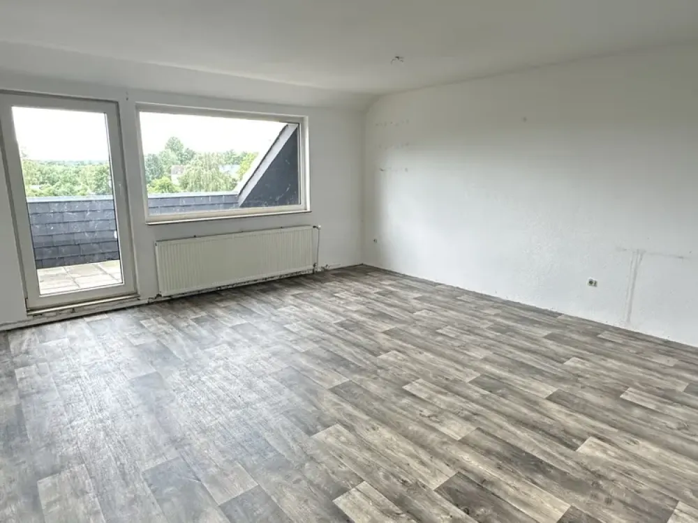 Geräumige Dachgeschosswohnung mit sonniger Loggia zu vermieten - WBS erforderlich