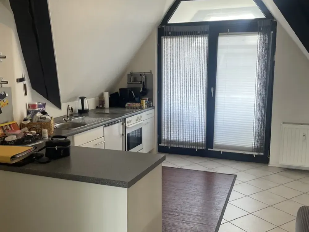 1-Zimmer Dachgeschoss Apartement mit Balkon