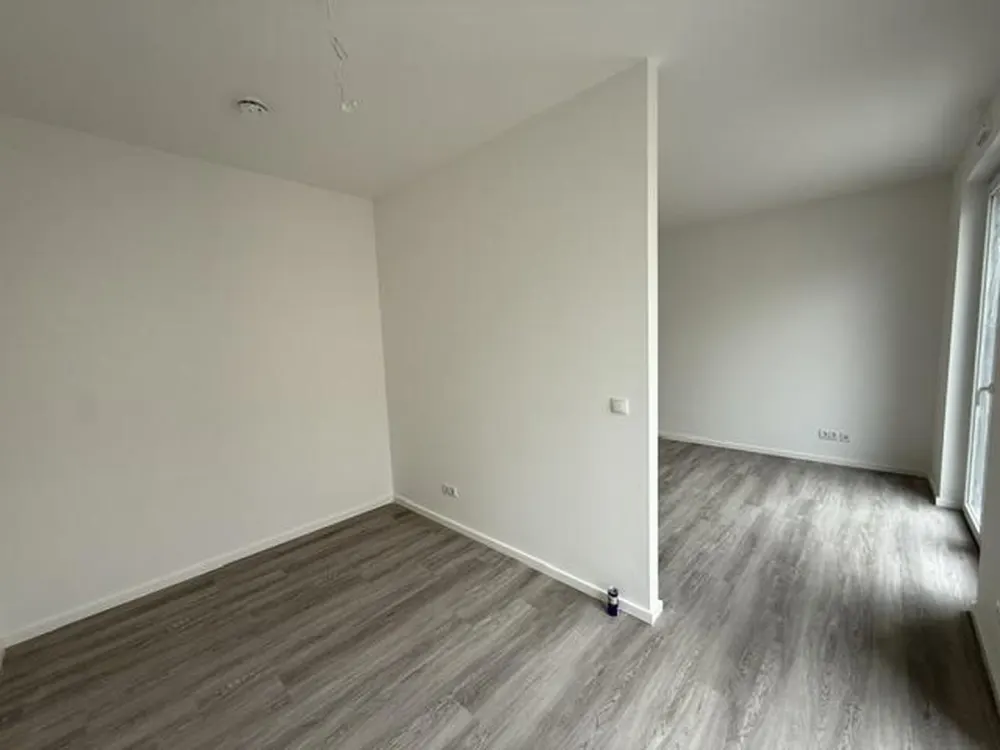 Exklusive 1-Zimmer-Wohnung mit Balkon, Aufzug und Tiefgaragenstellplatz