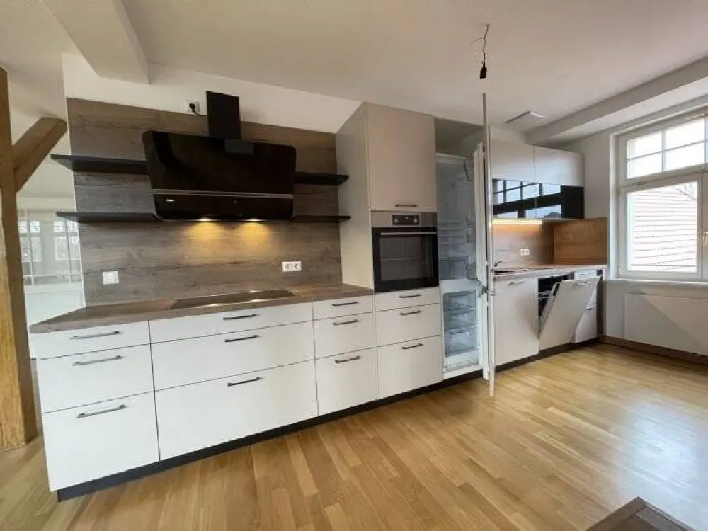Traumhafte Wohnung mit Dachterrasse und EBK im sanierten Denkmal