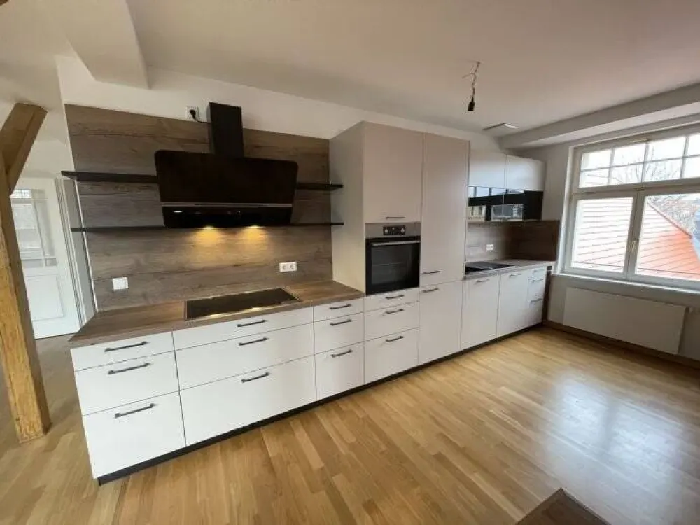 Traumhafte Wohnung mit Dachterrasse und EBK im sanierten Denkmal