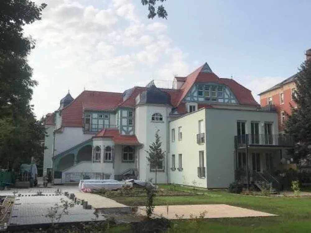 Traumhafte Wohnung mit Dachterrasse und EBK im sanierten Denkmal