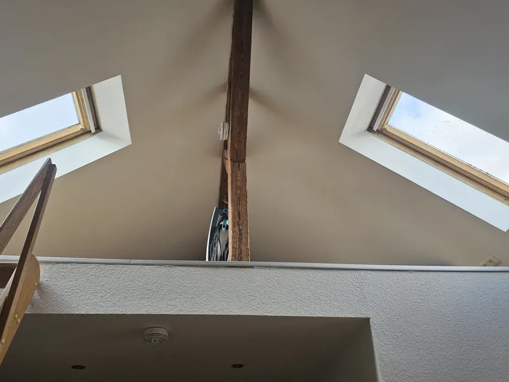 2-room attic apartment in a quiet location including fitted kitchen
