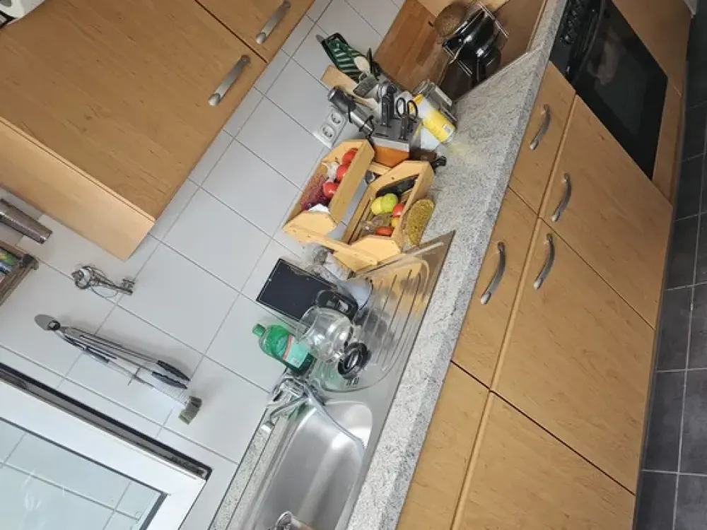 2-room attic apartment in a quiet location including fitted kitchen