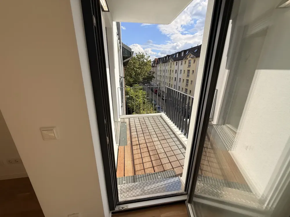 Erstbezug/Neubau: Helle 2-Zimmer-Neubauwohnung mit Südwest-Balkon und Eichenparkett