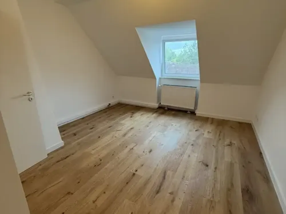 First occupancy after complete renovation - Attic apartment for singles in a quiet location