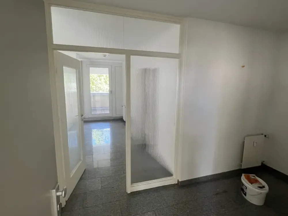 Maisonette Apartment with 4 Rooms, 4 Balconies, Optional Parking Space in the Heart of Brühl