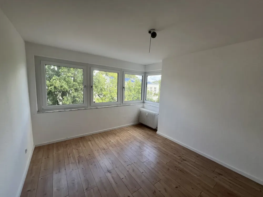 Maisonette Apartment with 4 Rooms, 4 Balconies, Optional Parking Space in the Heart of Brühl