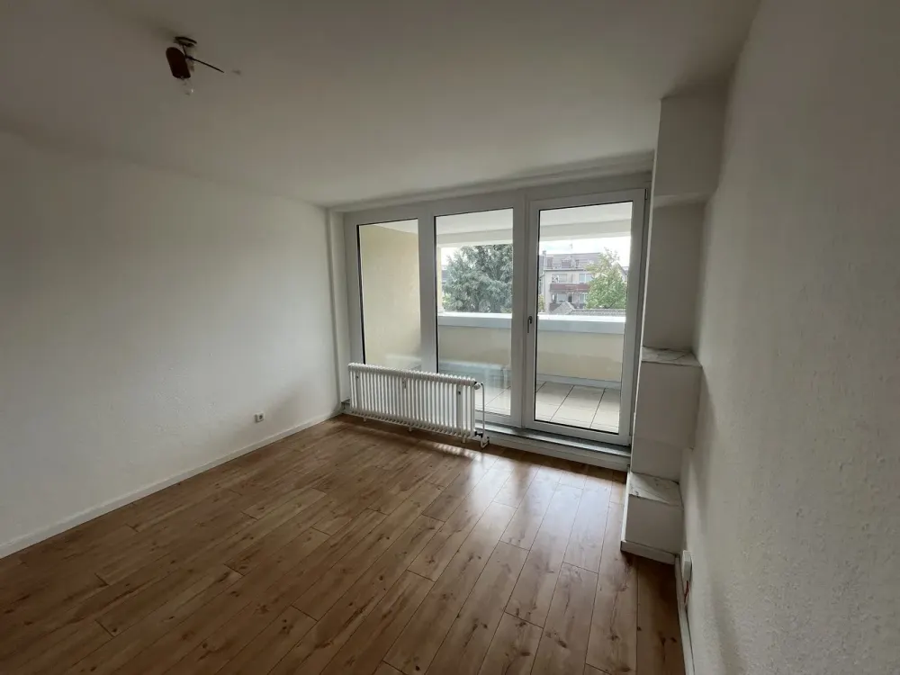 Maisonette Apartment with 4 Rooms, 4 Balconies, Optional Parking Space in the Heart of Brühl
