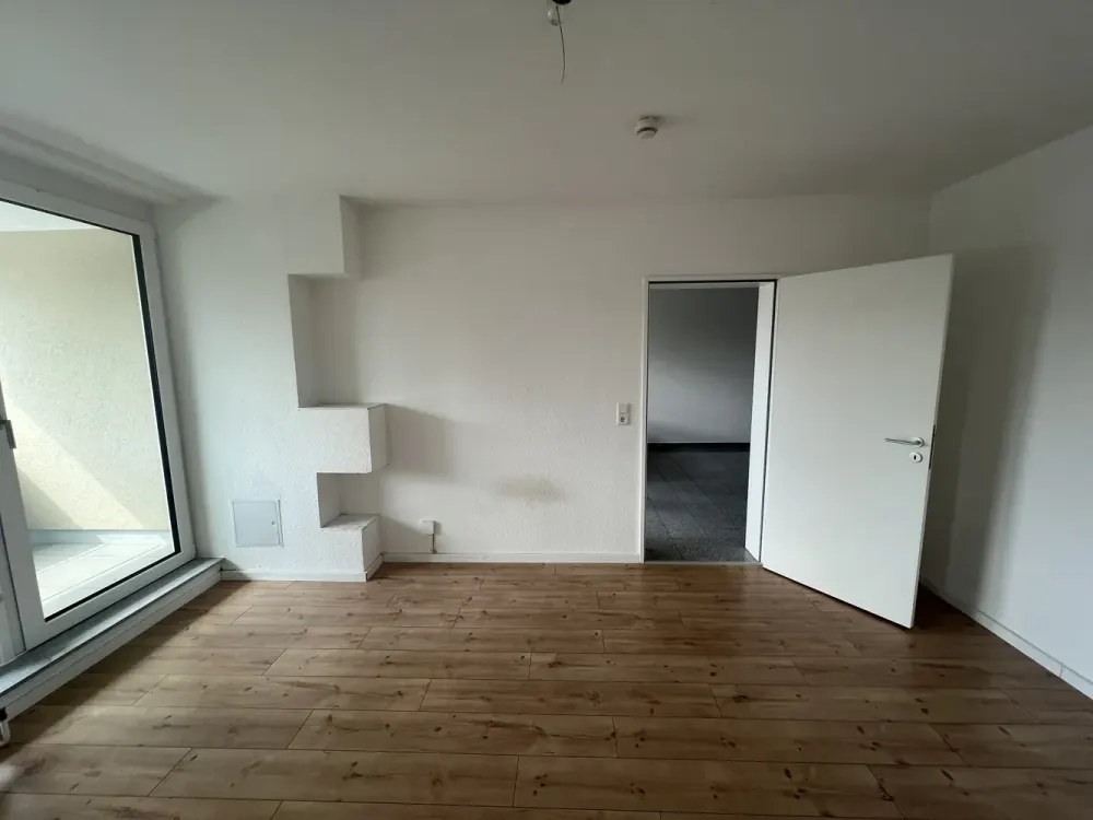 Maisonette Apartment with 4 Rooms, 4 Balconies, Optional Parking Space in the Heart of Brühl