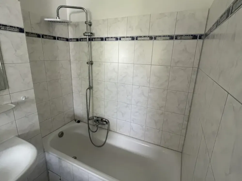 Maisonette Apartment with 4 Rooms, 4 Balconies, Optional Parking Space in the Heart of Brühl