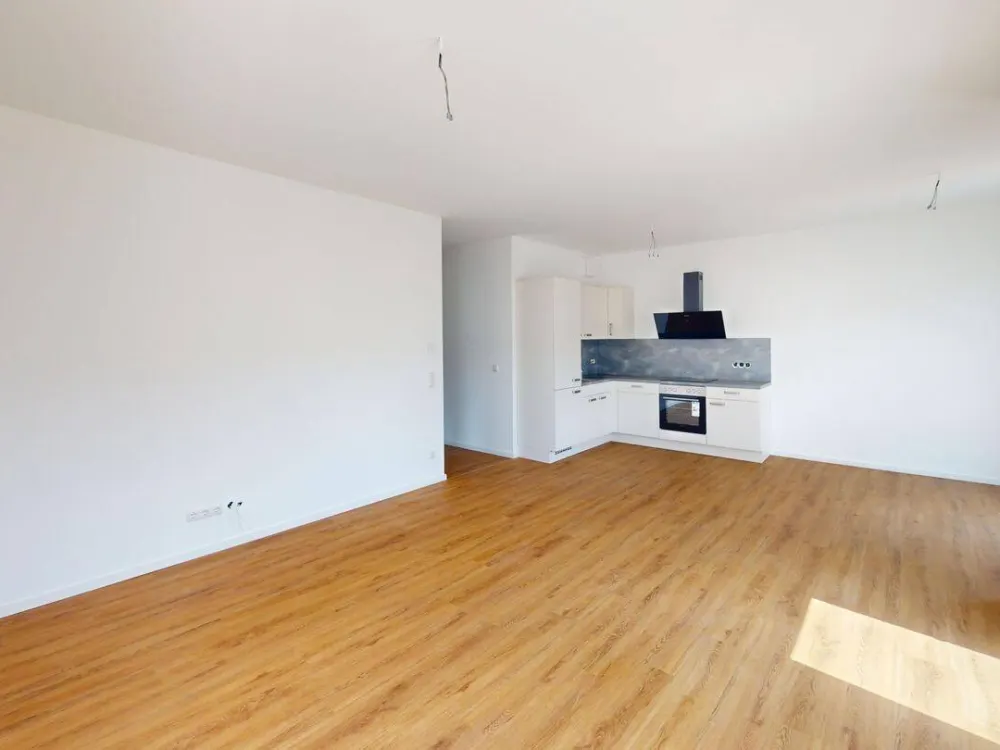 Hochwertige 2-Zimmer Wohnung im EG mit TERRASSE und EBK im Weißenseer Neubauquartier