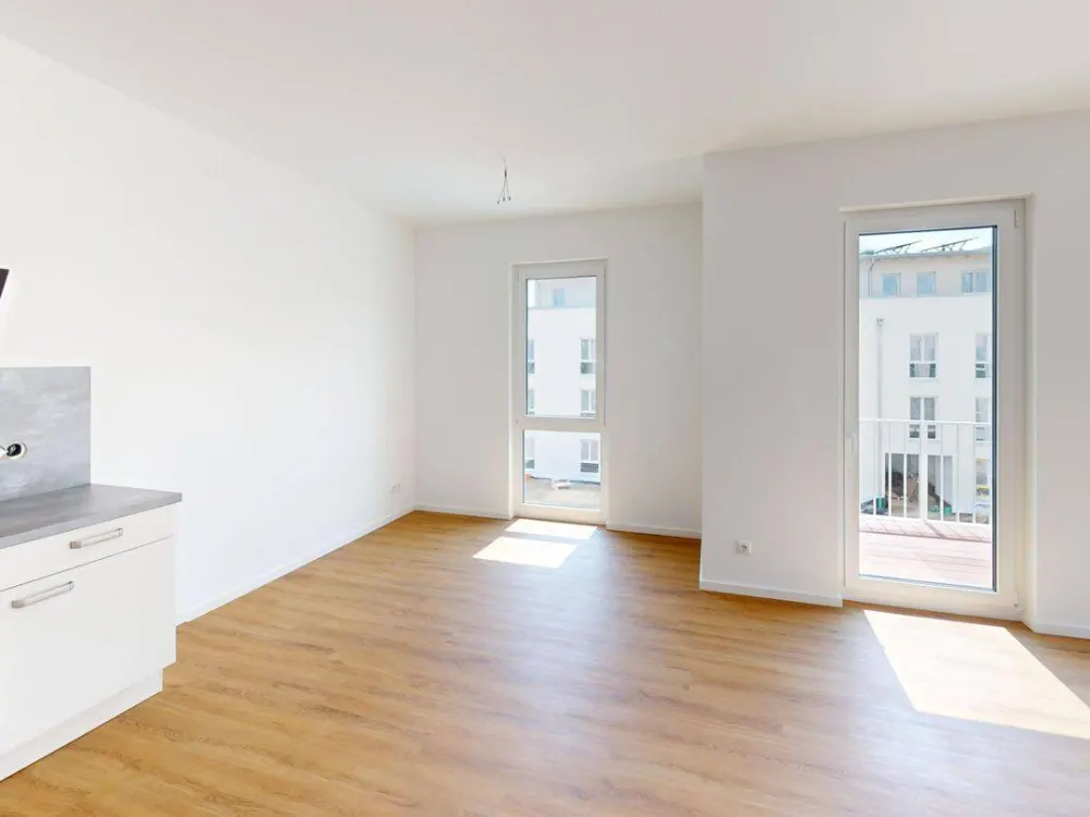 Hochwertige 2-Zimmer Wohnung im EG mit TERRASSE und EBK im Weißenseer Neubauquartier
