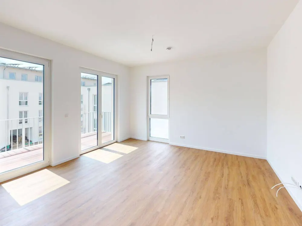 Hochwertige 2-Zimmer Wohnung im EG mit TERRASSE und EBK im Weißenseer Neubauquartier