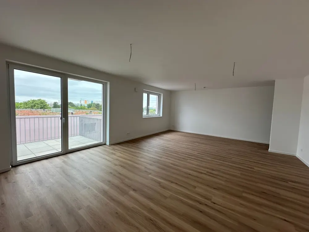 Erstbezug im Neubau - 4 Zimmer Wohnung mit offener Wohnküche, Balkon und Fußbodenheizung