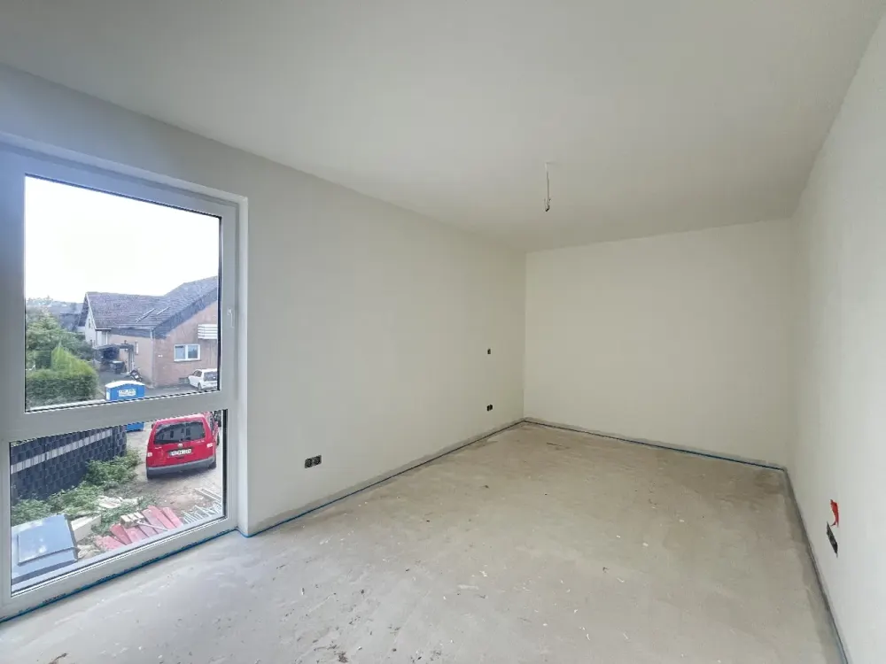 Erstbezug: 3-Zimmer-Wohnung im Obergeschoss mit Balkon