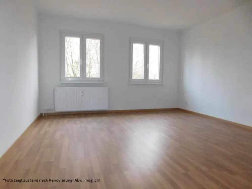 ***Bezugsfertige 3-Raumwohnung im EG mit Laminat und Balkon***