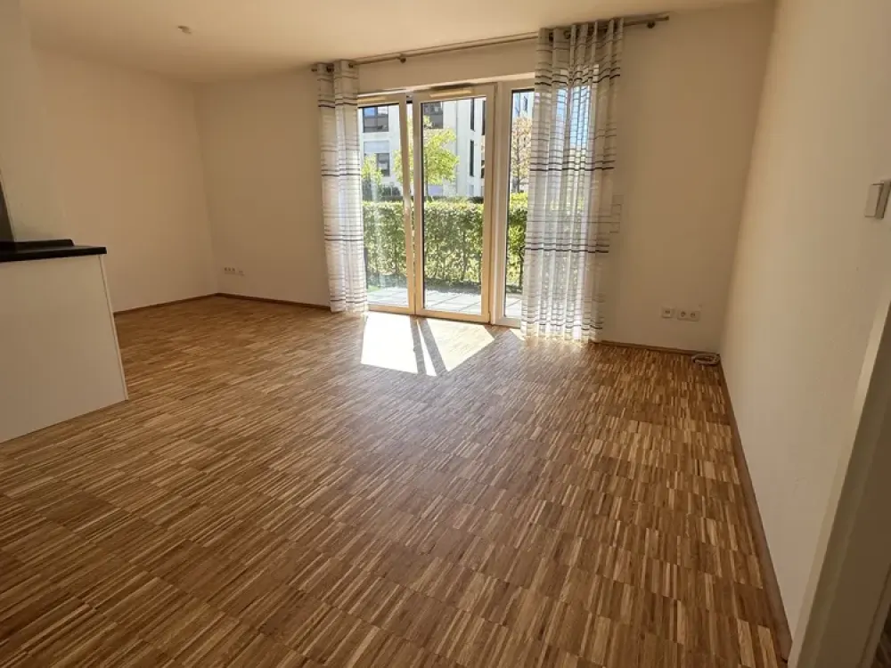 Hochwertige 2-Zimmer-Wohnung mit Terrasse, Einbauküche & Tiefgarage in ruhiger Lage