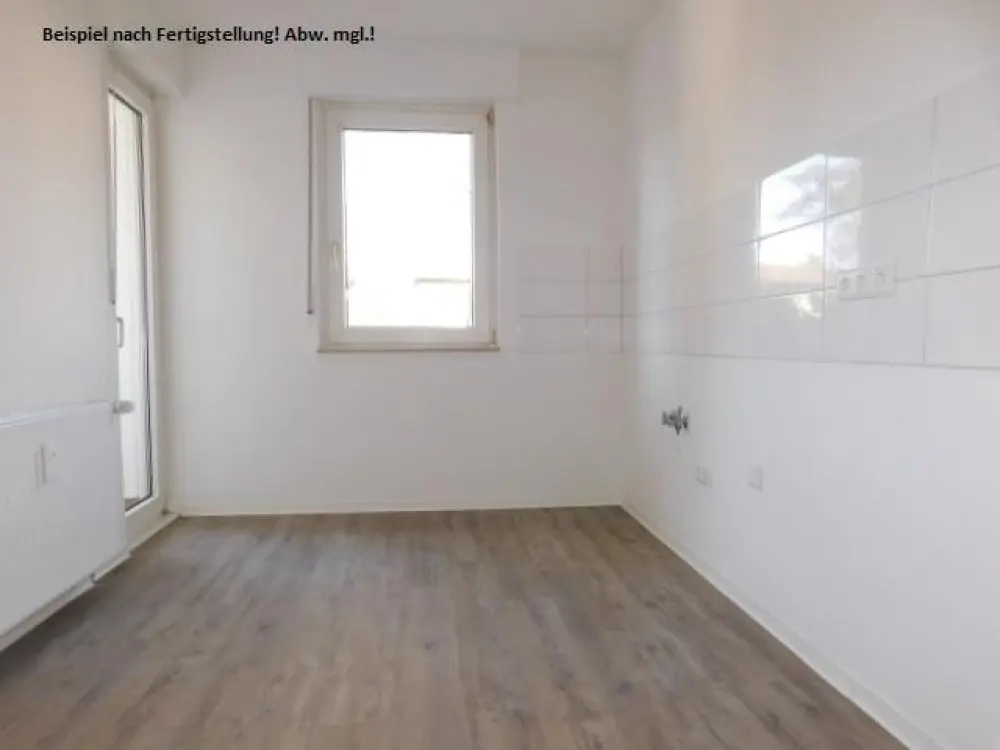 Einziehen und Wohlfühlen - schicke 2-Zimmer-Wohnung im EG mit Laminat und Balkon zentral gelegen...