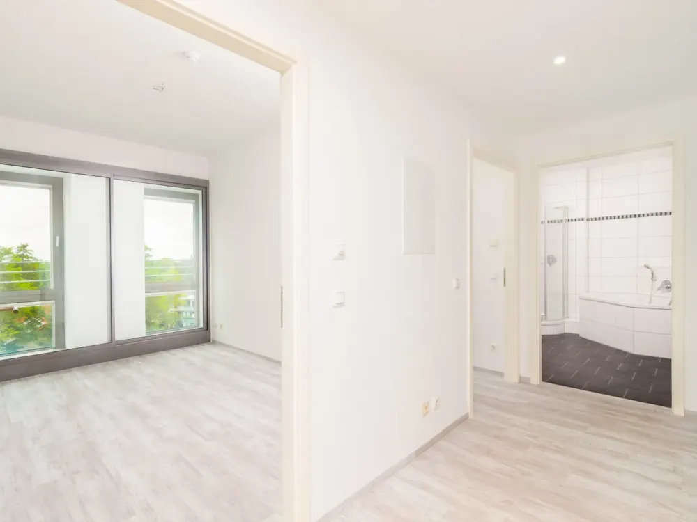 Baldhamer Ortskern, direkt am Marktplatz! Exklusive 3-Zimmer-Wohnung im "Turm"