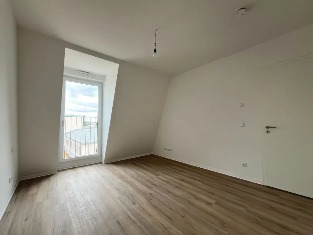 Neubau: Moderne 2-Zimmer-Dachgeschosswohnung mit Tageslichtbad und Loggia | Optional mit EBK