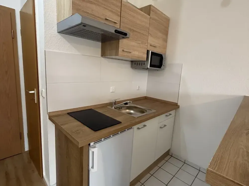 Attractive 2-Room Maisonette Apartment with Kitchenette, Balcony and Parking Space