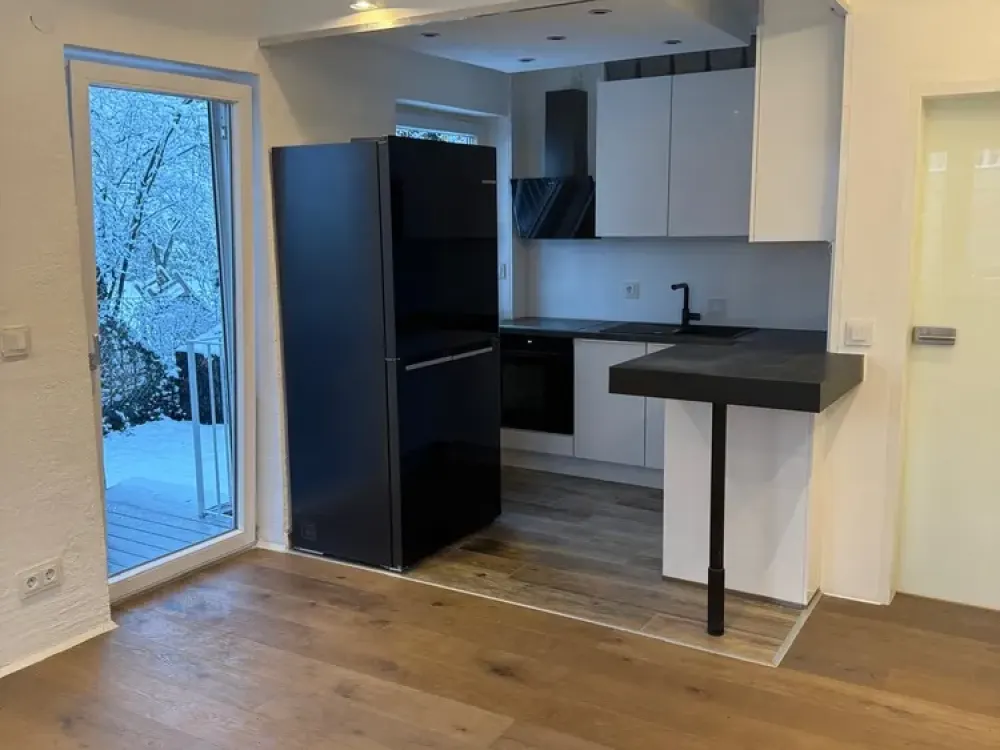 Gut ausgestattete Single Wohnung mit Garten (teilmöbliert)
