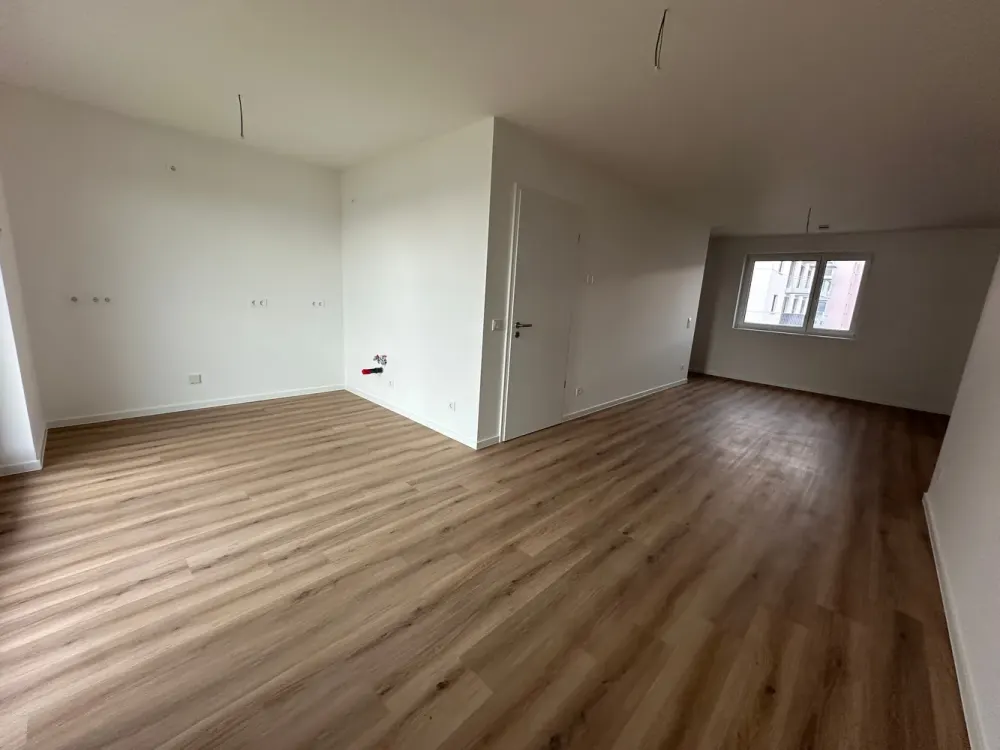 Modernes Wohnen im Neubau - 3 Zimmer Wohnung mit Balkon, Aufzug und Fußbodenheizung