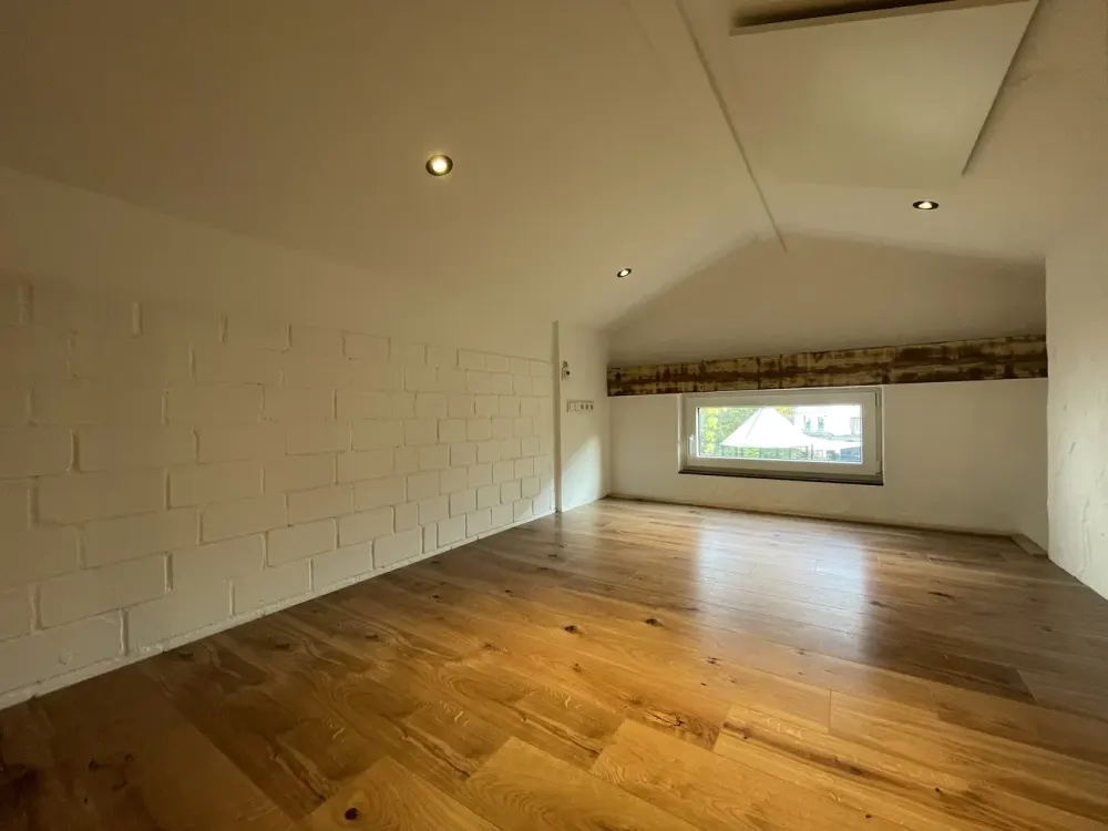 Living in a Green Oasis: Stylish 1-Room Garden Apartment with Built-in Kitchen and Pellet Stove