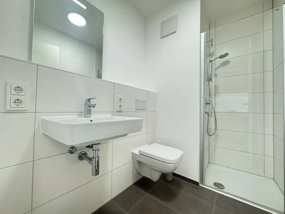 Exklusives 1-Zimmer-Neubauapartment, stilvoll vollmöbliert